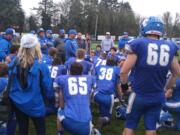 La Center football coach John Lambert talks to his players after their 17-7 loss to Connell on Saturday (Tim Martinez/The Columbian)