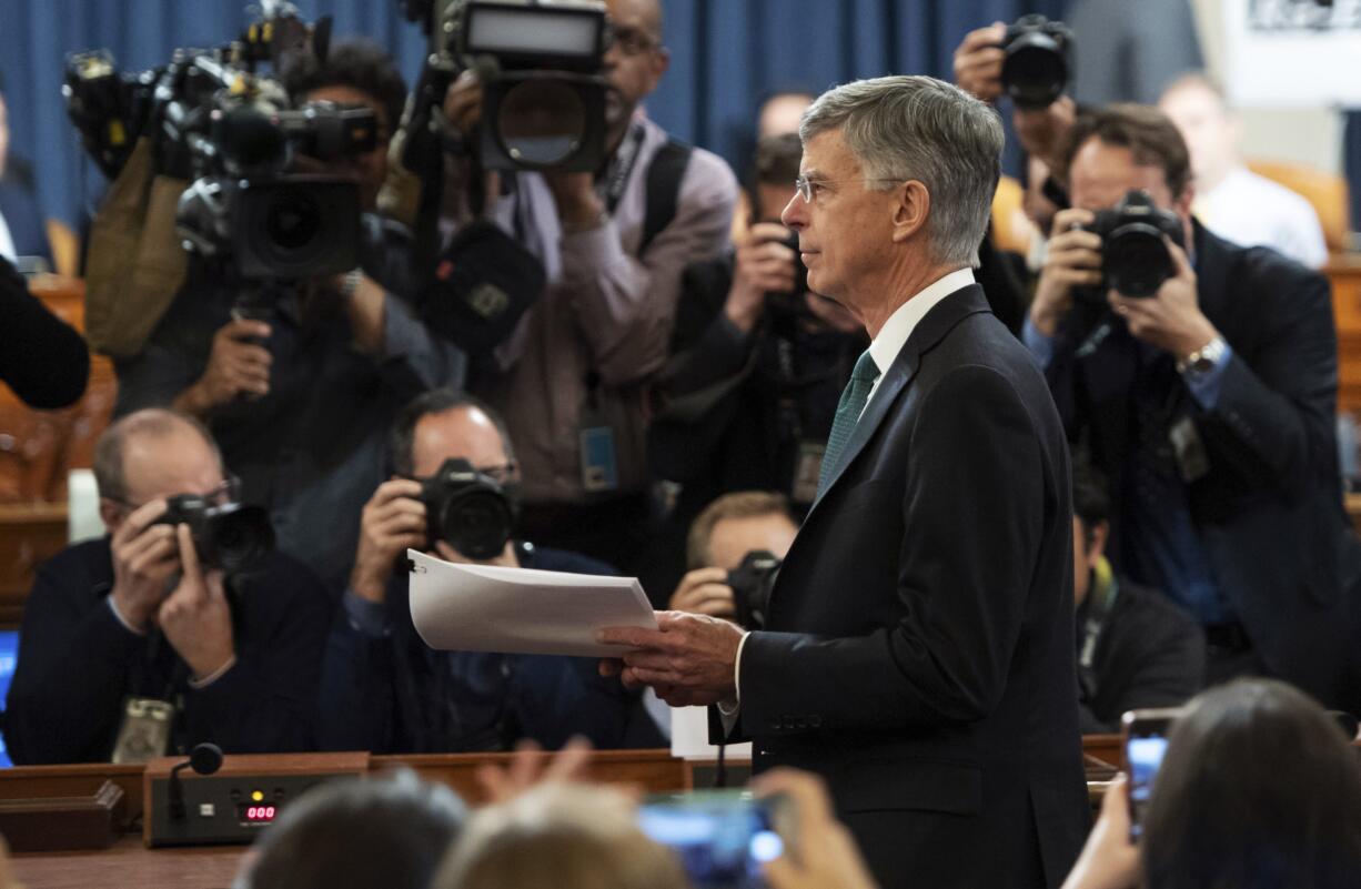 Top U.S. diplomat in Ukraine William Taylor arrives to testify before the House Intelligence Committee on Capitol Hill in Washington, Wednesday, Nov. 13, 2019, during the first public impeachment hearing of President Donald Trump's efforts to tie U.S. aid for Ukraine to investigations of his political opponents.