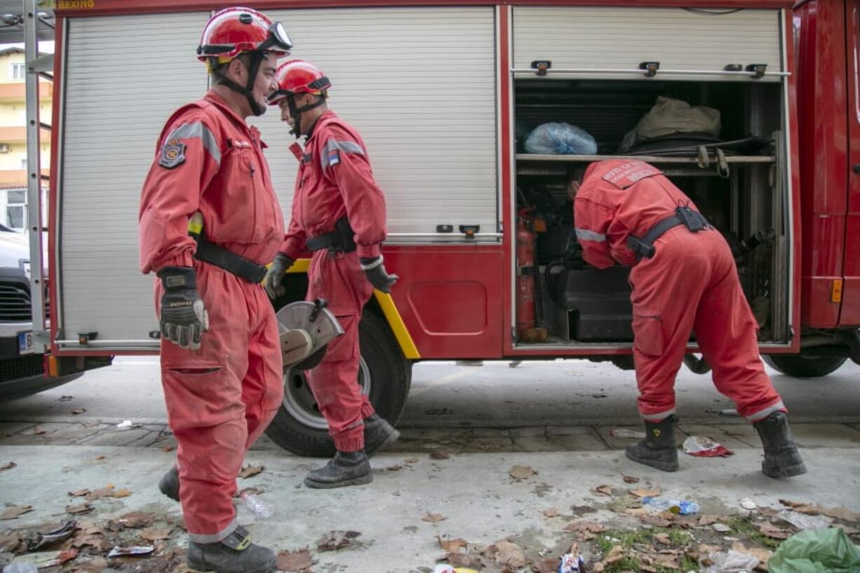 In this photo taken on Friday, Nov. 29, 2019, rescuers from Serbia operate at a collapsed building after the 6.4-magnitude earthquake in Durres, western Albania. In the initial hours after a deadly pre-dawn earthquake struck Albania, pancaking buildings and trapping dozens of sleeping people beneath the rubble, the country&#039;s neighbors sprang into action. Offers of help flooded in from across Europe and beyond, with even traditional foes setting aside their differences in the face of the natural disaster. The 6.4-magnitude earthquake that struck Albania on Tuesday killed at least 49 people, injured 2,000 and left at least 4,000 homeless.