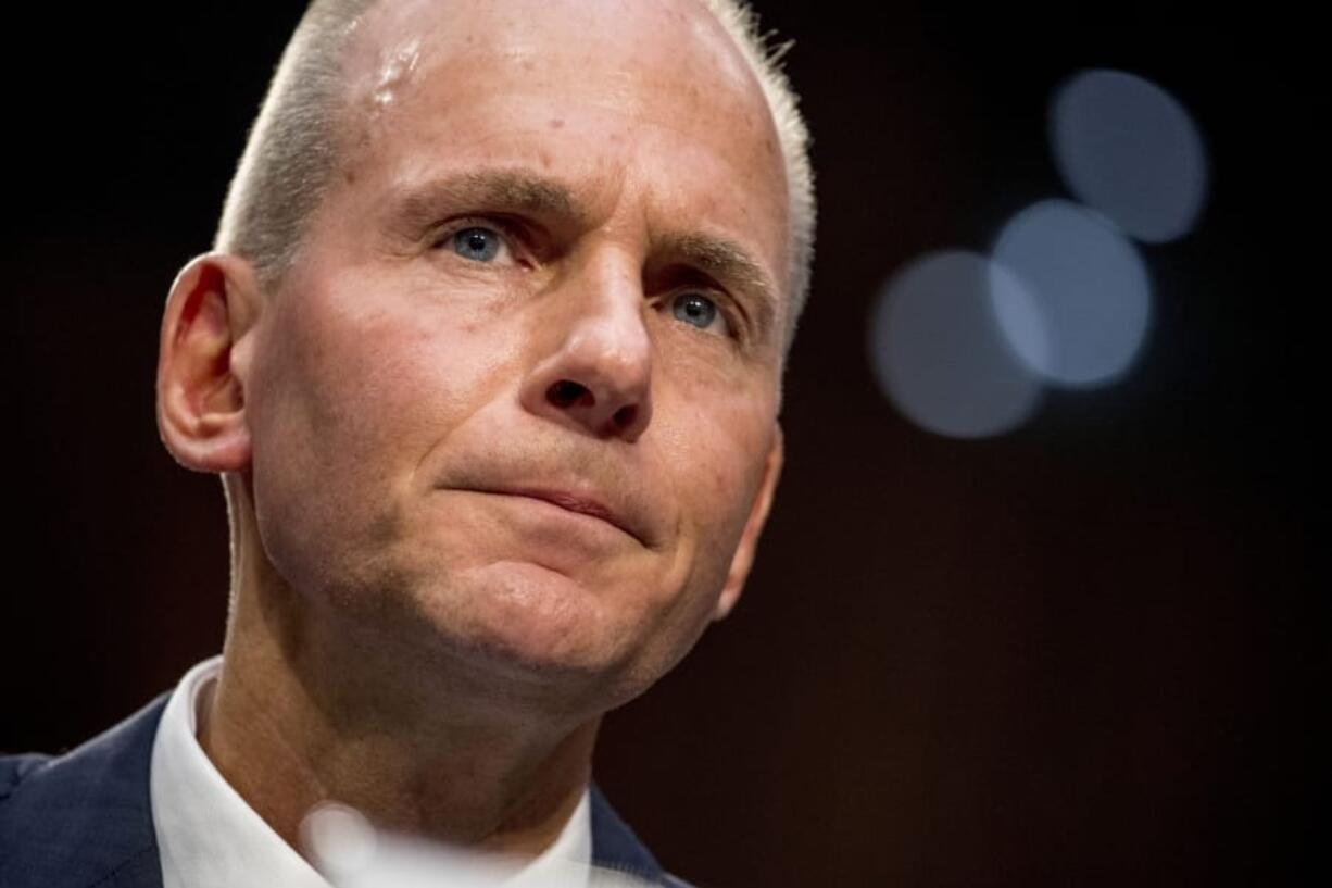 FILE - In this Oct. 29, 2019, file photo Boeing Company President and Chief Executive Officer Dennis Muilenburg appears before a Senate Committee on Commerce, Science, and Transportation hearing on &#039;Aviation Safety and the Future of Boeing&#039;s 737 MAX&#039; on Capitol Hill in Washington. Boeing&#039;s new chairman gave Muilenburg a vote of confidence Tuesday , Nov. 5, and said the chief executive is giving up any bonus this year.