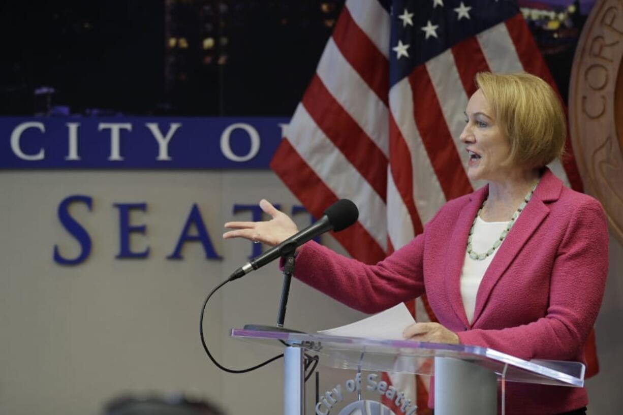 Seattle Mayor Jenny Durkan speaks during a news conference, Thursday, Nov. 7, 2019, in Seattle. Durkan said Thursday that the city will file a lawsuit to block the $30 car tab initiative sponsored by anti-tax activist Tim Eyman that was passed by Washington voters in Tuesday&#039;s general election. Durkan said that if fully implemented, Initiative 976 would force the city to cut more than 100,000 bus hours and would hamper free bus access for students and low-income residents. (AP Photo/Ted S.