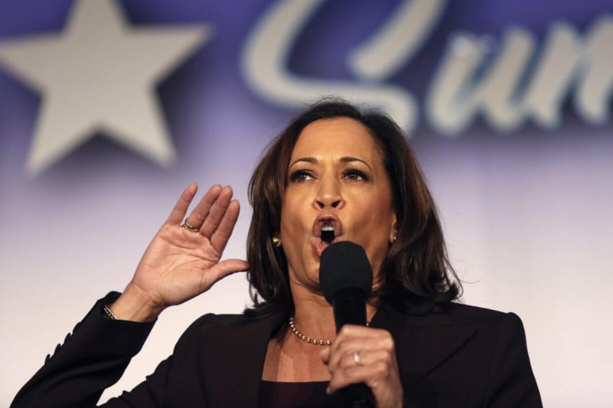 FILE - In this Oct. 4, 2019, file photo, Democratic presidential candidate Sen. Kamala Harris, D-Calif., speaks at the SEIU Unions For All Summit in Los Angeles. A battle is emerging between presidential candidates Elizabeth Warren and Harris for the support of black women, the Democratic Party&#039;s most loyal and consistent voters. (AP Photo/Ringo H.W.