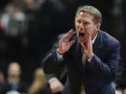 Gonzaga coach Mark Few has a few more challenges this season has he has to replace four starters from last year's squad. (AP Photo/Jae C.