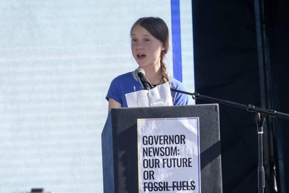 Climate change activist Greta Thunberg speaks after a climate change march in Los Angeles on Friday, Nov. 1, 2019. Thunberg says young people are rallying to fight climate change because their age leaves them with the most to lose from damage to the planet. (AP Photo/Ringo H.W.