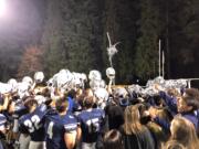 Skyview football players and students celebrate a 49-0 win over Federal Way in the 4A state preliminary round on Friday at Kiggins Bowl (Micah Rice/The Columbian)