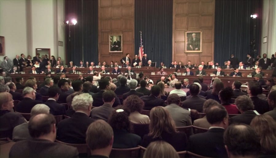 FILE - In this Nov. 19, 1998 file photo, House Judiciary Committee Chairman Rep. Henry Hyde, R-Ill., presides over the committee&#039;s impeachment hearing for President Bill Clinton, on Capitol Hill in Washington. The public impeachment inquiry hearings this week usher in a rare and momentous occasion in American history as Congress debates whether to remove a sitting president from office.