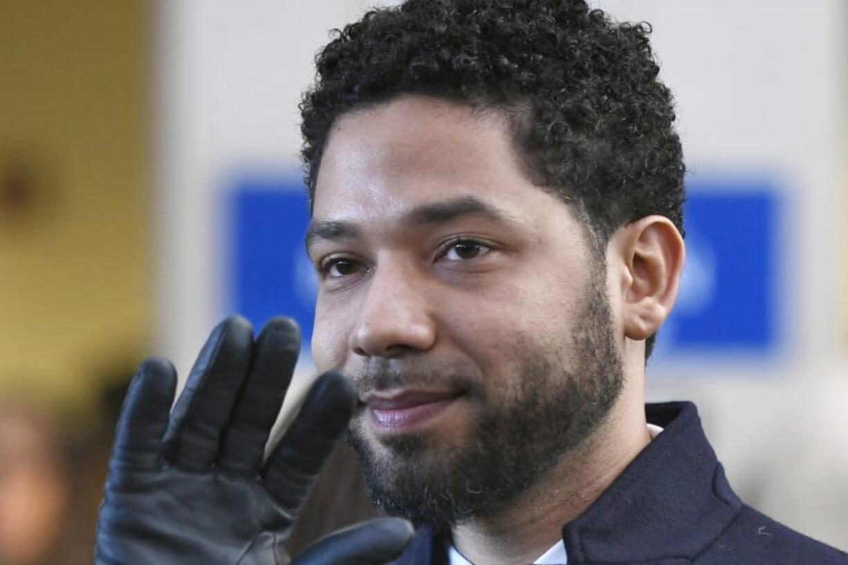 FILE - In this March 26, 2019 file photo, former &quot;Empire&quot; actor Jussie Smollett smiles and waves to supporters before leaving Cook County Court after his charges were dropped in Chicago. Smollett says his $10,000 payment after the close of a criminal case should prevent Chicago from seeking reimbursement for a police investigation of his claim that he was a victim of a racist and homophobic attack. Smollett&#039;s attorneys filed a response to Chicago&#039;s lawsuit Tuesday, Nov. 19, 2019. They also filed a counterclaim against the city, saying Smollett was the victim of a malicious prosecution. Smollett told police he was beaten by two men.