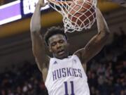 Washington&#039;s Nahziah Carter dunks against Maine during the second half of an NCAA college basketball game Tuesday, Nov. 19, 2019, in Seattle.