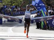 Joyciline Jepkosgei, of Kenya, crosses the finish line to win the Pro Women&#039;s Division of the New York City Marathon, in New York&#039;s Central Park, Sunday, Nov. 3, 2019.