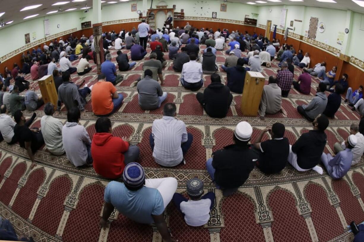 In this Oct. 18, 2019, photo, Kurds attend Friday prayers at the Salahadeen Center in Nashville, Tenn. Nashville has the largest Kurdish population in the U.S. The community of up to 40,000 Kurds has felt largely helpless to aid their homeland of late, as images of death and despair invade social media. Many feel a new level of betrayal by President Donald Trump after watching Turkey attack their people and push them out of Syria.