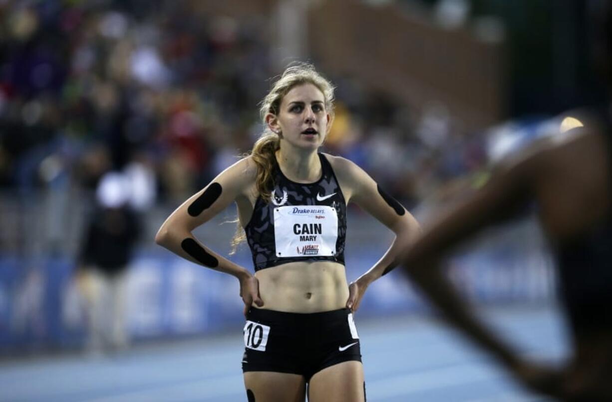 Mary Cain walks off the track after competing in the women&#039;s special 1500-meter run at the Drake Relays athletics meet, on April 29, 2016, in Des Moines, Iowa.