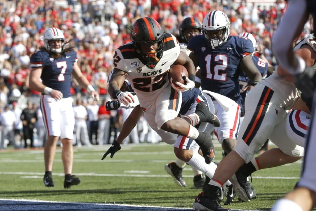 Oregon State running back Jermar Jefferson (22) scores a touchdown against Arizona in the first half during an NCAA college football game, Saturday, Nov. 2, 2019, in Tucson, Ariz.