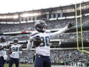 Seattle Seahawks&#039; Bradley McDougald (30) celebrates after intercepting a Philadelphia Eagles&#039; pass during the first half of an NFL football game, Sunday, Nov. 24, 2019, in Philadelphia.