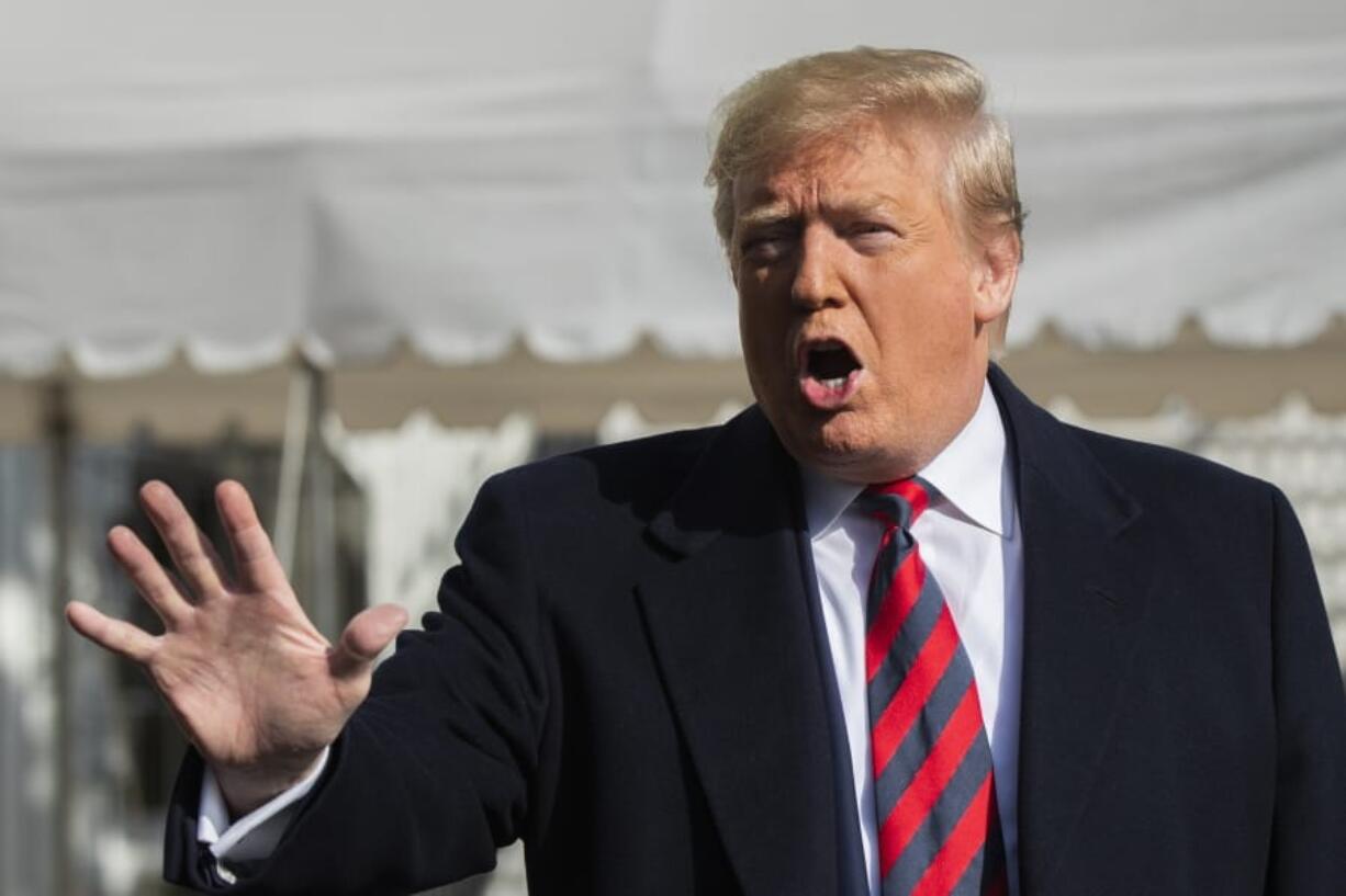 President Donald Trump talks to the media before leaving the White House, Saturday, Nov. 9, 2019, in Washington.