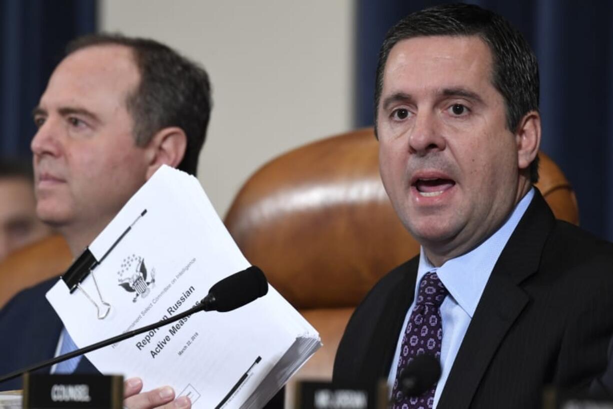 Ranking member Rep. Devin Nunes of Calif., gives an opening statement as former White House national security aide Fiona Hill, and David Holmes, a U.S. diplomat in Ukraine, testify before the House Intelligence Committee on Capitol Hill in Washington, Thursday, Nov. 21, 2019, during a public impeachment hearing of President Donald Trump&#039;s efforts to tie U.S. aid for Ukraine to investigations of his political opponents. At left is House Intelligence Committee Chairman Adam Schiff, D-Calif.