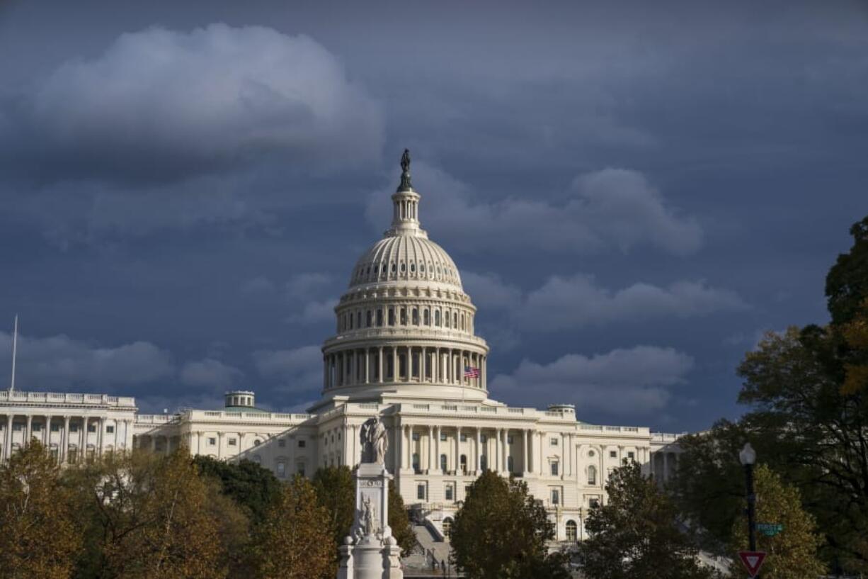 The Capitol is seen beneath dark skies Tuesday in Washington, D.C. (j.