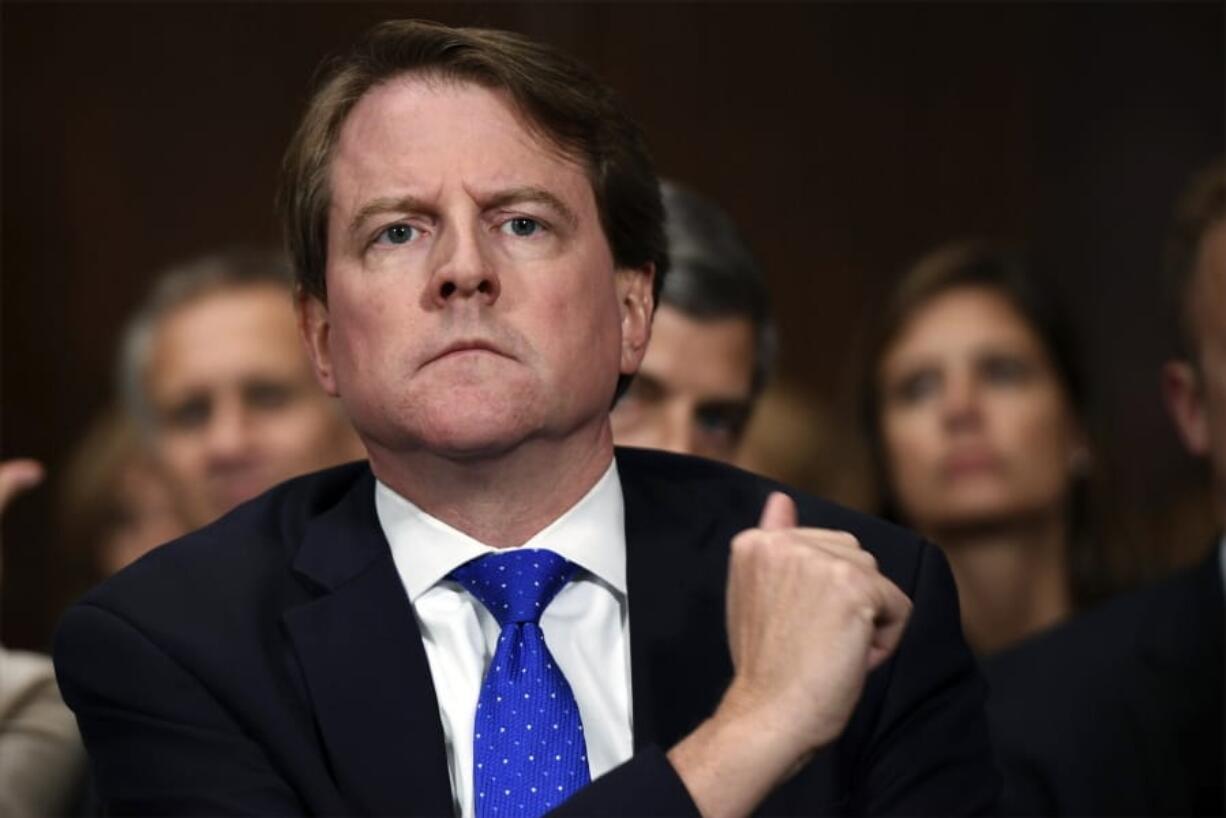 FILE - In this Sept. 27, 2018, file photo, then-White House counsel Don McGahn listens as Supreme court nominee Brett Kavanaugh testifies before the Senate Judiciary Committee on Capitol Hill in Washington. A federal judge has ordered McGahn to appear before Congress in a setback to President Donald Trump&#039;s effort to keep his top aides from testifying. The outcome could lead to renewed efforts by House Democrats to compel testimony from other high-ranking officials, including former national security adviser John Bolton.