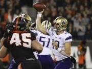 Washington quarterback Jacob Eason (10) throws a pass during the first half of the team&#039;s NCAA college football game against Oregon State in Corvallis, Ore., Friday, Nov. 8, 2019.