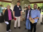 Jane Shields Lussier, from left, the daughter of former high school football coach Dutch Shields; John Gentry, of the Vancouver Fire Department; Pat Klinger, retired marketer at Burgerville and group founder; and Brad Richardson, executive director of the Clark County Historical Museum, gathered at a picnic in September for the Facebook group "Growing up in Vancouver, WA." (Contributed photo)