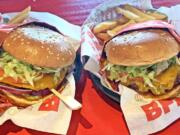 An Impossible Burger next to a beef hamburger at Red Robin.