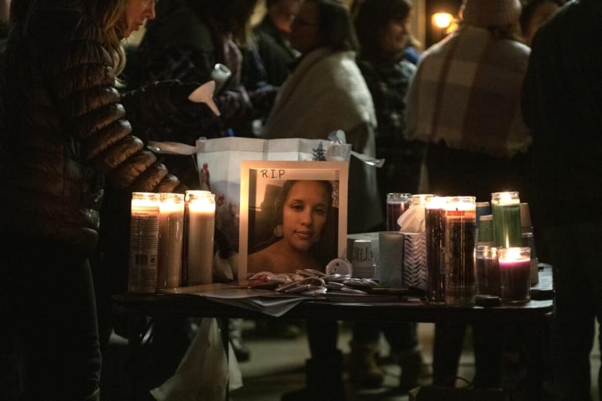 A photo of Tiffany Hill is seen on display at a candlelight vigil Sunday at Esther Short Park in Vancouver.