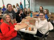 Minnehaha: Volunteers helped fold more than 130,000 bags to be used in today&#039;s Walk &amp; Knock food drive.