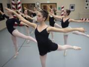 Cassidy Morris, center, rehearses with other dancers for an upcoming production of &quot;The Nutcracker&quot; at the Columbia Dance Center.