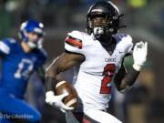 Camas' Jacques Badolato-Birdsell (2) runs in a 48-yard touchdown during Saturday’s Class 4A state championship game against Bothell at Mount Tahoma High School in Tacoma on Dec. 7, 2019.