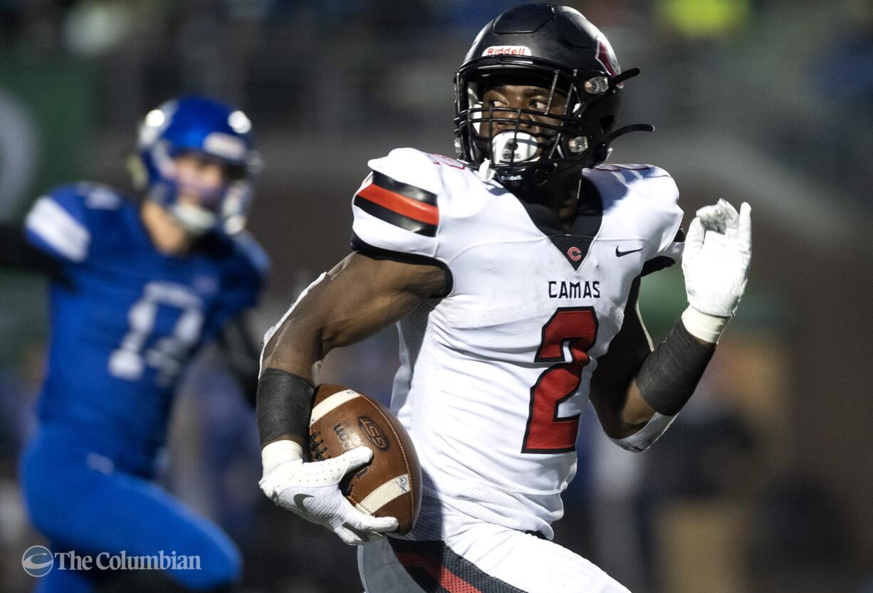 Camas' Jacques Badolato-Birdsell (2) runs in a 48-yard touchdown during Saturday’s Class 4A state championship game against Bothell at Mount Tahoma High School in Tacoma on Dec. 7, 2019.