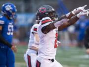 Camas' Jacques Badolato-Birdsell (2) celebrates a touchdown during SaturdayÕs Class 4A state championship game against Bothell at Mount Tahoma High School in Tacoma on Dec. 7, 2019.