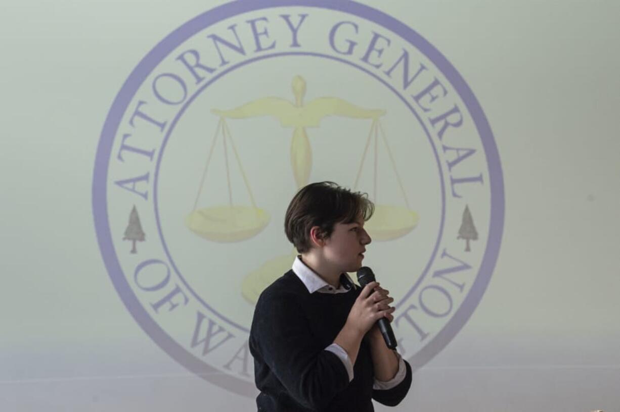 Event organizer Kyle Nelson, 18, introduces a video from state Attorney General Bob Ferguson during the Use Your Voice advocacy training event at Excelsior High School on Thursday.