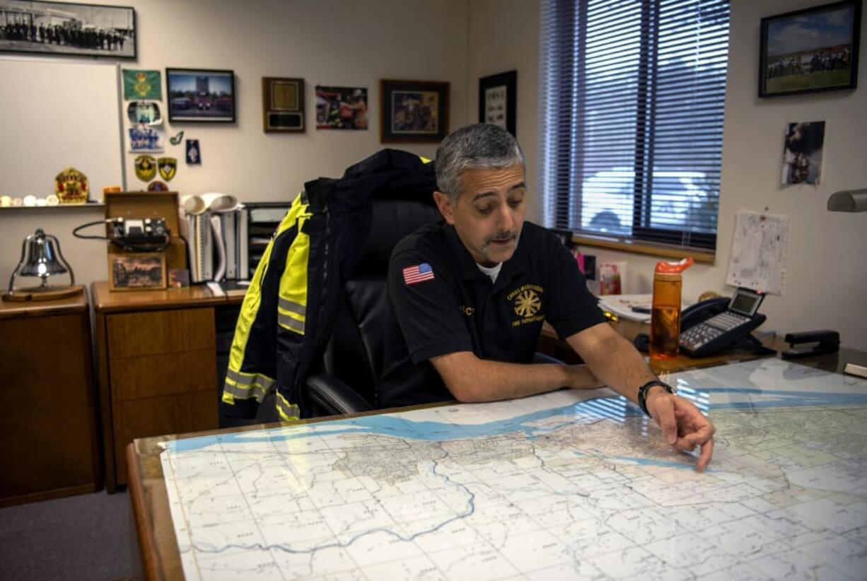 Fire Chief Nick Swinhart describes the Camas-Washougal Fire Department coverage area at his office at Station 42 in Camas. A consulting group recently finished a report saying the department isn&#039;t laid out well enough to provide adequate coverage, and suggested relocating two stations and building another.