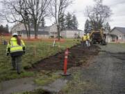 Archaeologist Elaine Dorset walks to a construction site while working at Fort Vancouver National Historic Site on Wednesday morning.