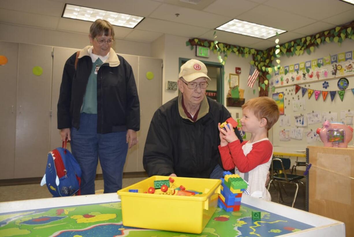 Washougal: Christine and Dennis Callaghan spend time in the classroom with grandson first grader Eamon Callaghan during Cape Horn-Skye&#039;s annual Grandparents Day.