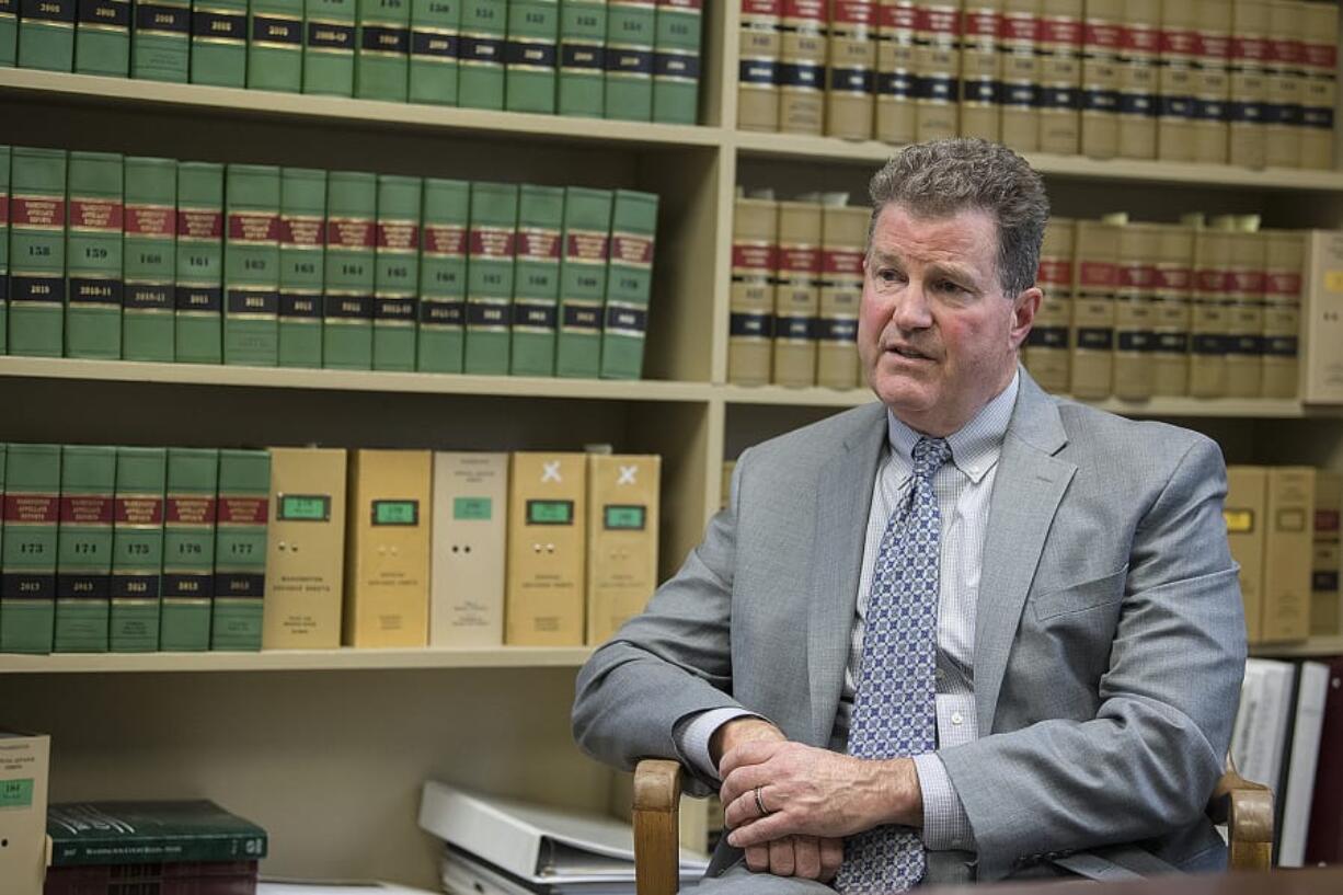 Clark County Superior Court Judge John Fairgrieve talks in his office Friday afternoon about what factors generally go into determining bail and why domestic violence cases are particularly tough to decide.