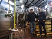 Co-owners of Backwoods Brewing, Tom Waters, left, and Steve Waters stand inside their production facility in Stevenson. The brewery has seen a large amount of growth since it opened in 2012.