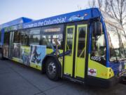 One of the new city-themed buses featuring photos of Washougal is pictured on a C-Tran bus as it stops at the Fisher&#039;s Landing Transit Center in Vancouver on Dec. 13, 2019.