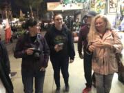 Columbian Photo Editor Amanda Cowan, left, and Assistant Metro Editor Jessica Prokop explore downtown Tijuana, Mexico, in November 2019 with Ramon and Enedis Flores.