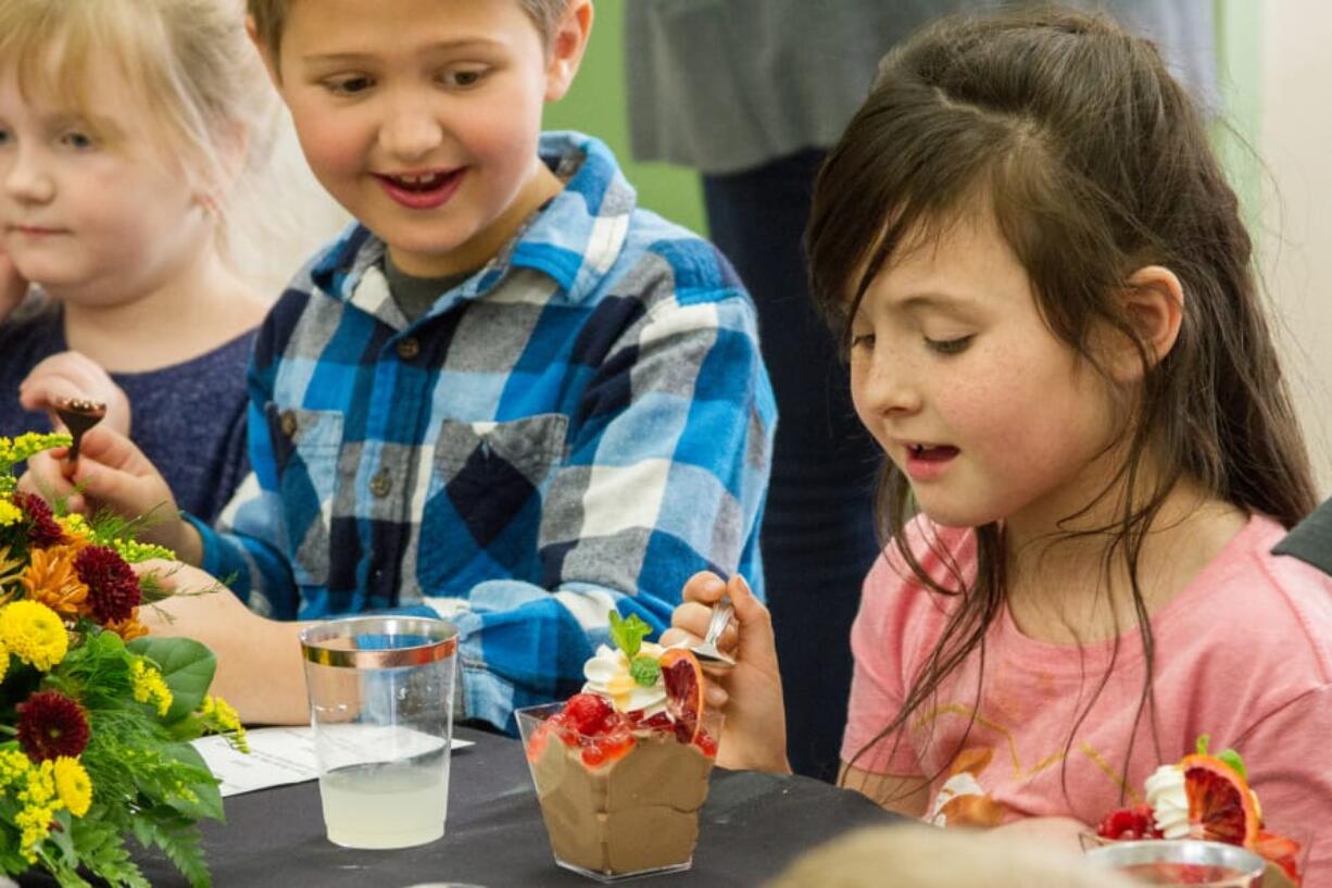 WOODLAND: Yale Elementary School students enjoyed chocolate and blood orange mousse with whipped cream during a catered, multicourse meal.