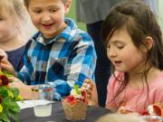 WOODLAND: Yale Elementary School students enjoyed chocolate and blood orange mousse with whipped cream during a catered, multicourse meal.