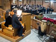 Laurie Chinn accompanies the Vancouver Master Chorale as it sings Handel&#039;s &quot;Messiah&quot; last year at First Presbyterian Church in Vancouver. The choir will host a free &quot;Messiah&quot; singalong Dec. 13.