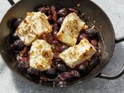 Roasted Feta With Grapes and Olives.