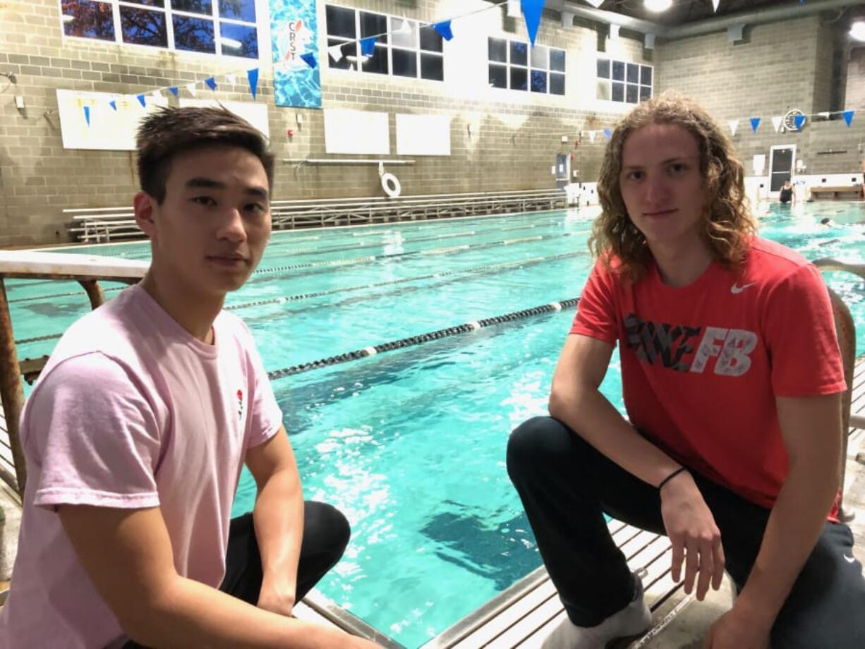 Camas swimmers Jaden Kim, left, and Luke Bales are part of the Papermakers&#039; senior leadership in the pool.