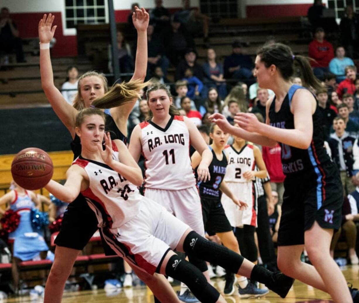 While R.A. Long must replace its top players, returners such as Bobbi Clark, left, give the Lumberjills hope.