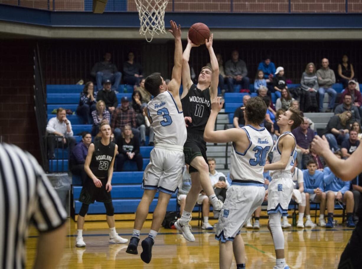 Senior guard Isaiah Flanagan (11) will be expected to handle a bulk of the scoring this season for Woodland.