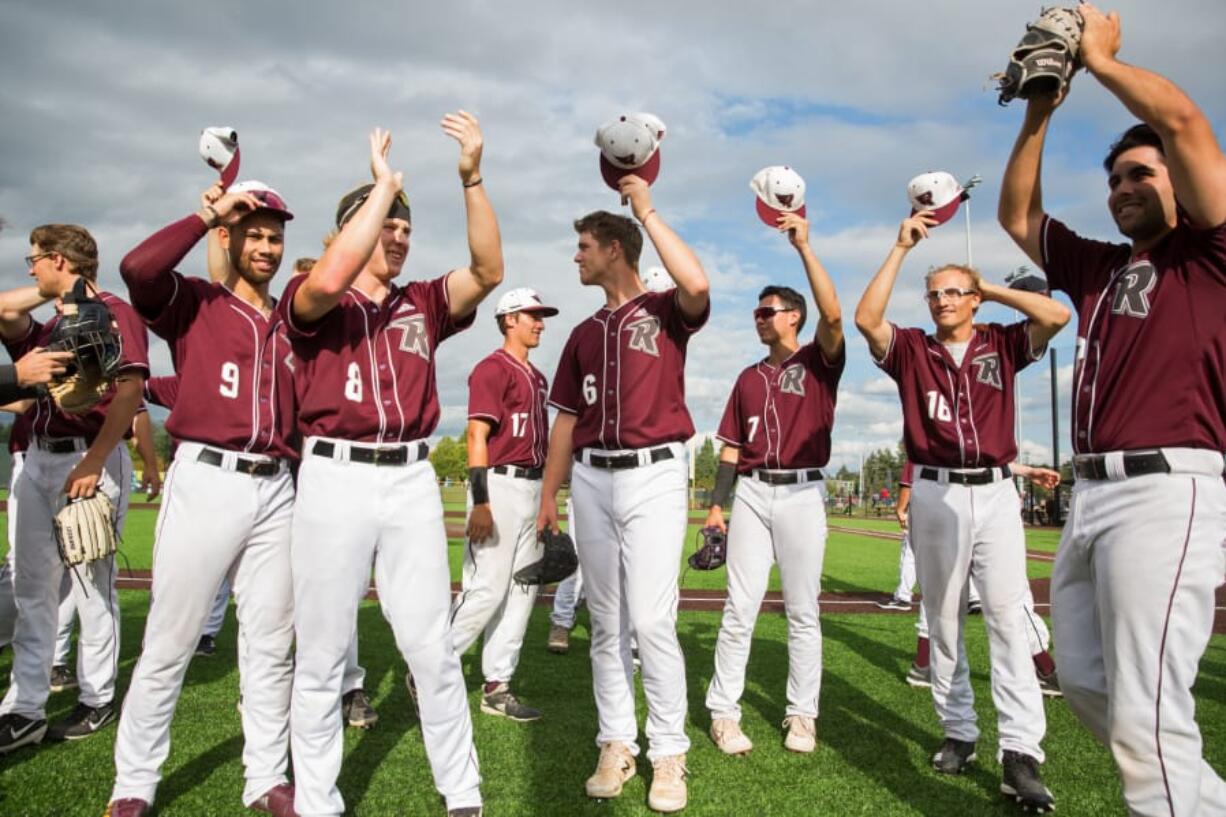 Members of the Ridgefield Raptors wave to the crowd after the final game of the season at the Ridgefield Outdoor Recreation Complex.