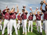 Members of the Ridgefield Raptors wave to the crowd after the final game of the season at the Ridgefield Outdoor Recreation Complex.