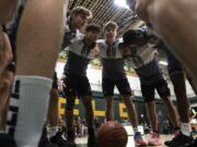 Union huddles prior to their game against Evergreen at Evergreen High School on Wednesday night, Dec. 17, 2019.