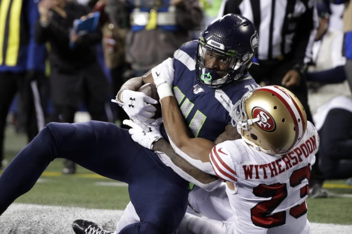 Seattle Seahawks&#039; Marshawn Lynch (24) scores a touchdown on a 1-yard rush against the San Francisco 49ers during the second half of an NFL football game, Sunday, Dec. 29, 2019, in Seattle.