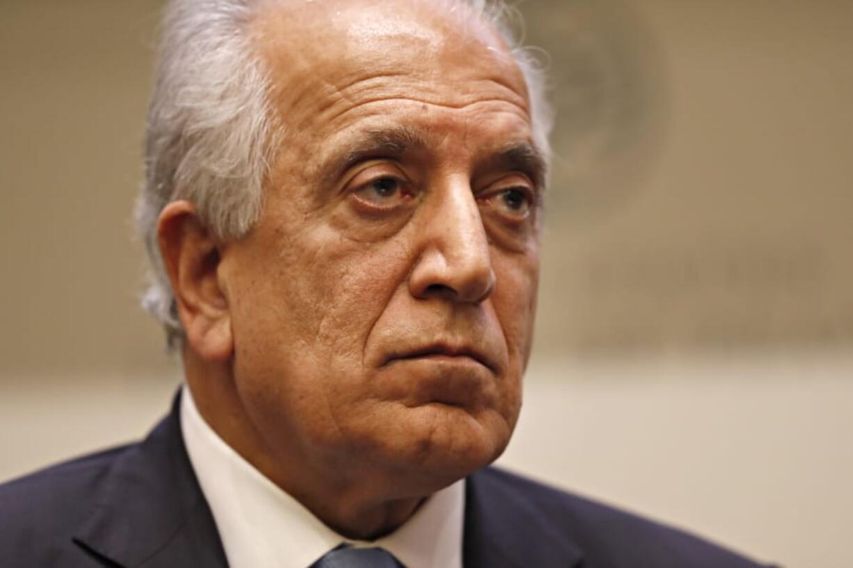 FILE - In this Feb. 8, 2019, file photo, Special Representative for Afghanistan Reconciliation Zalmay Khalilzad pauses while speaking about the prospects for peace, at the U.S. Institute of Peace, in Washington.  Afghanistan&#039;s former deputy minister says Khalilzad is in the Afghan capital &quot;to discuss the latest in peace efforts.&quot;  Former deputy foreign minister Hekmat Karzai tweeted pictures of his meeting with Khalilzad Wednesday, Dec.